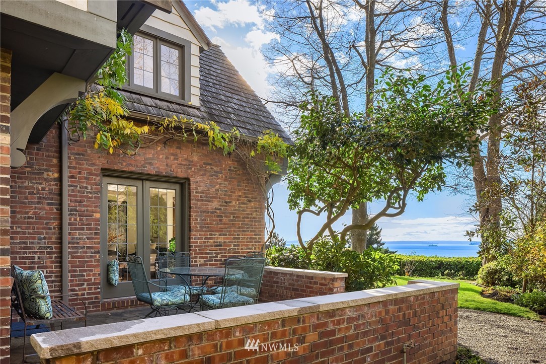 4706 West Ruffner Street Seattle, WA 98199 - Photo 4 of 27 a view of house with outdoor space and porch