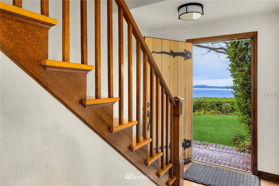 4706 West Ruffner Street Seattle, WA 98199 - Photo 10 of 27 a view of balcony with wooden floor and white walls