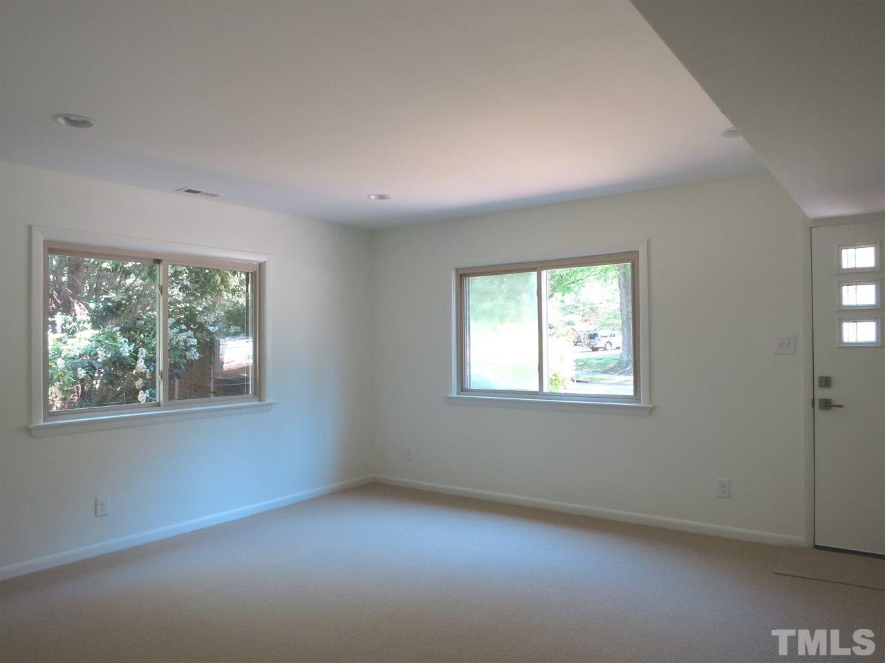 600 Davidson Street Raleigh, NC 27609 - Photo 22 of 25 This is Bedroom 5 which has an exterior door to the driveway and could be used as an Office.