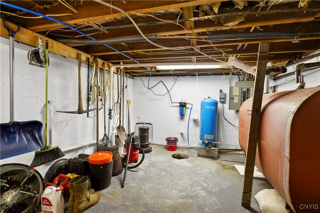 8119 Capron Road Forestport, NY 13494 - Photo 29 of 37 Basement storage area, oil tank & Well tank