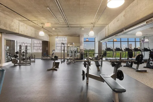 a view of a hallway with dining area