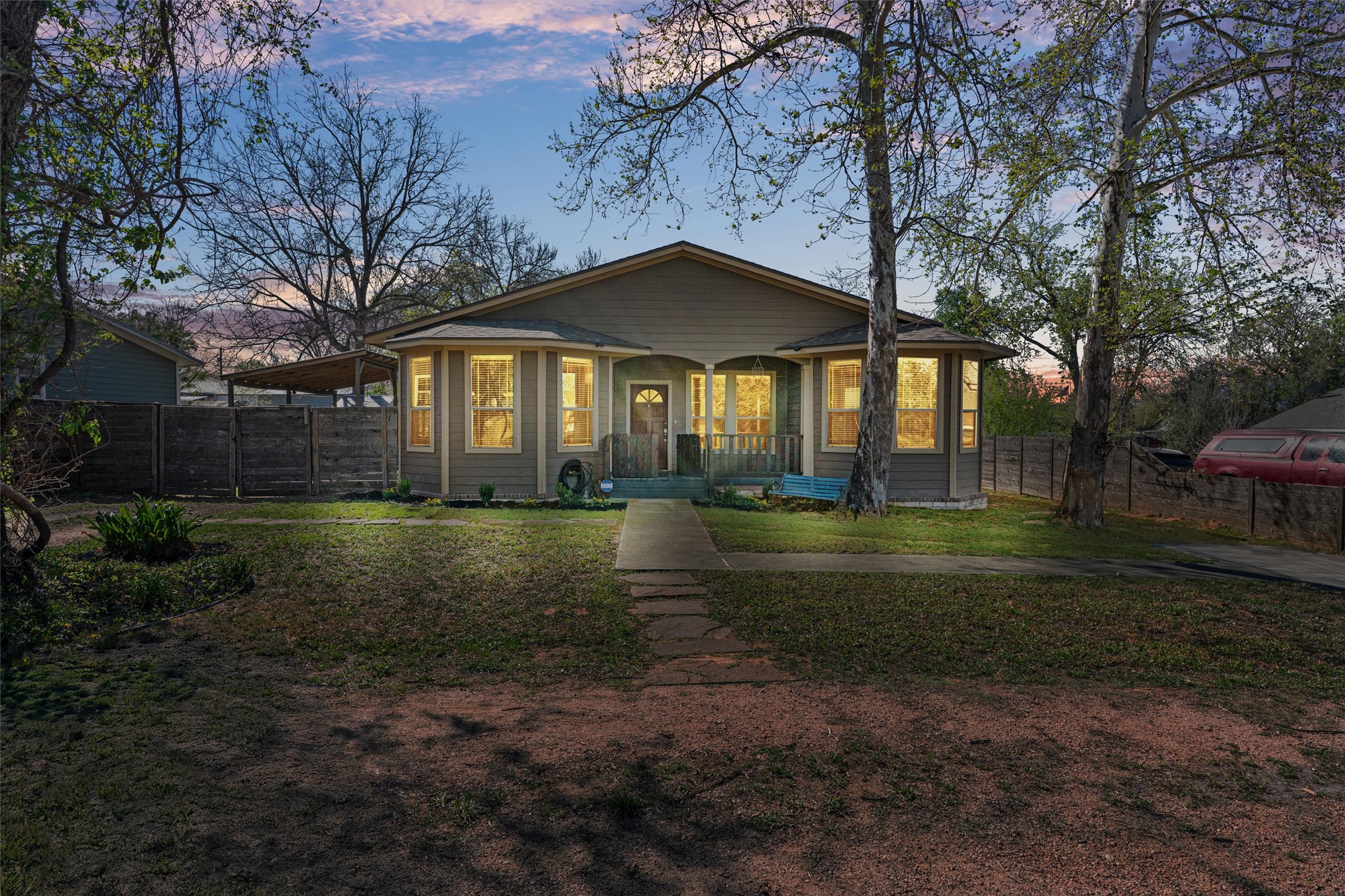 Back of property featuring a porch