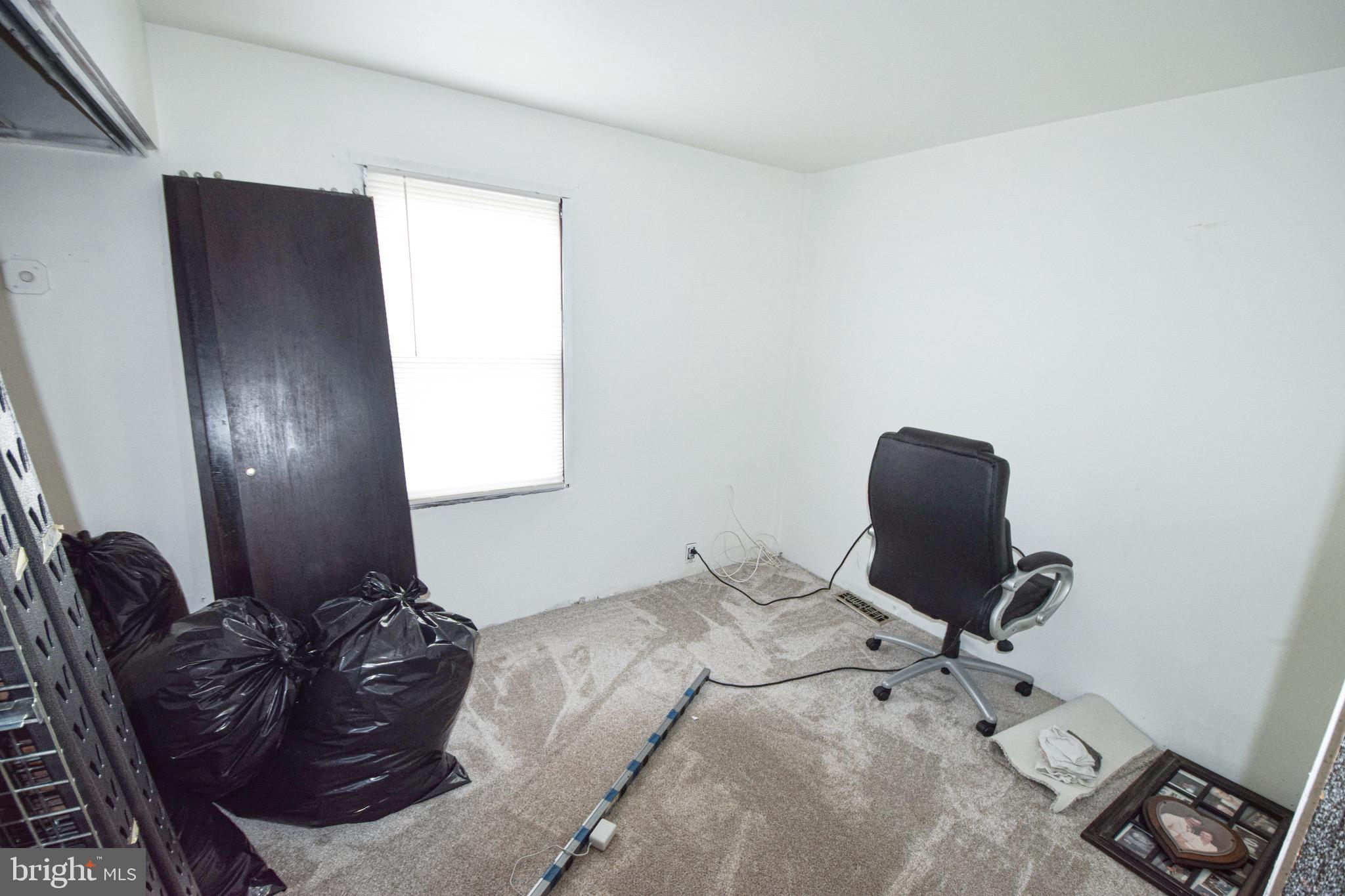21 Right Aileron Baltimore, MD 21220 - Photo 12 of 31 a bed room with a bed and a chair