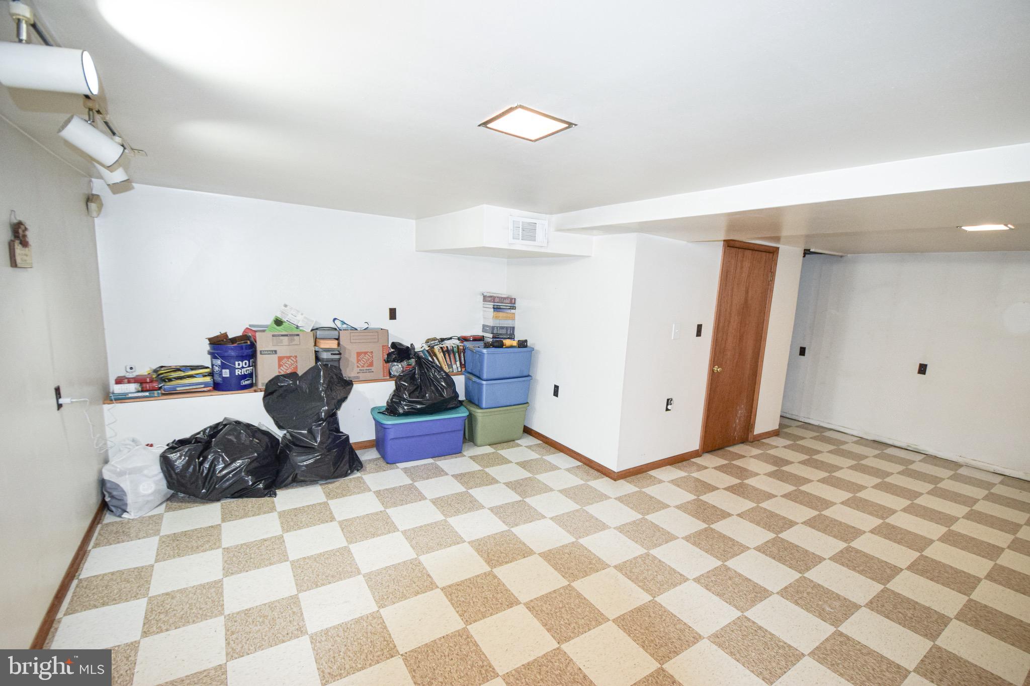 21 Right Aileron Baltimore, MD 21220 - Photo 14 of 31 a bed room with a bed and a table