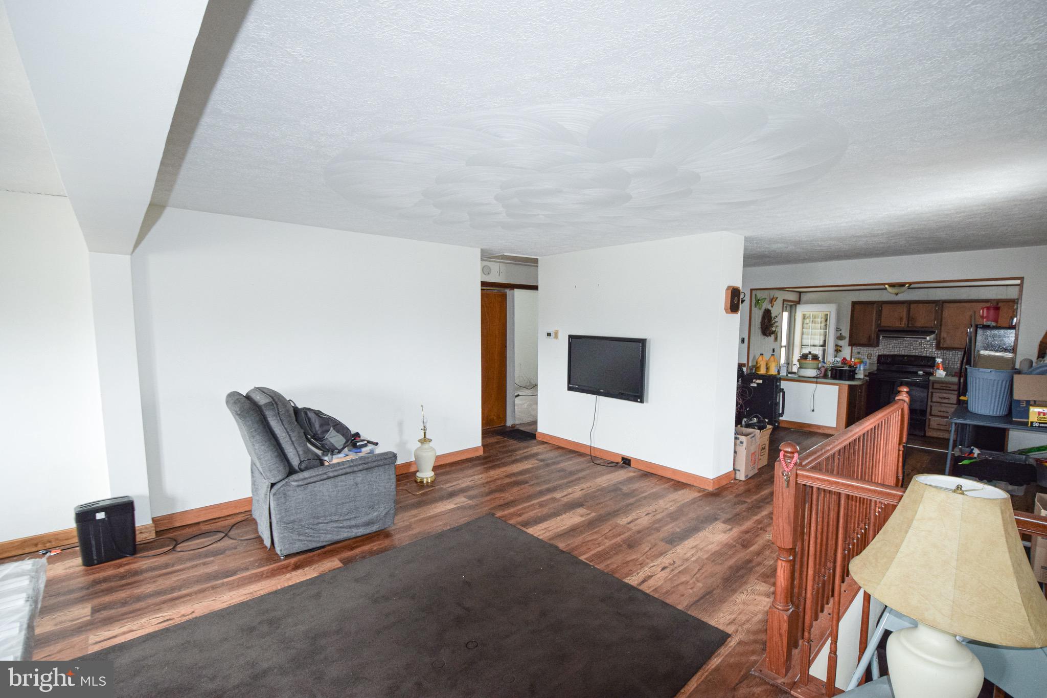 21 Right Aileron Baltimore, MD 21220 - Photo 2 of 31 a bedroom with furniture and wooden floor