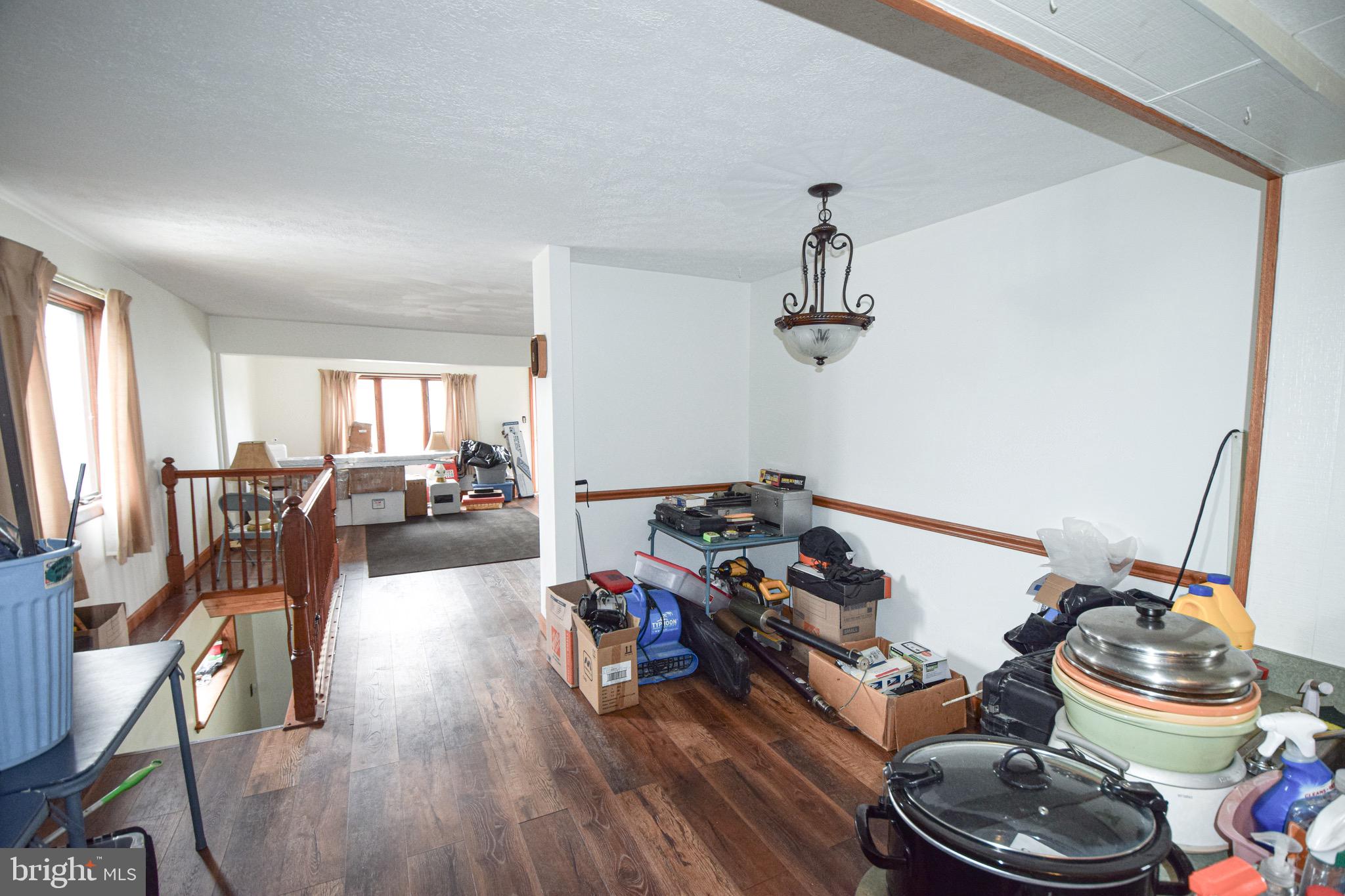 21 Right Aileron Baltimore, MD 21220 - Photo 7 of 31 a bed room with furniture and a wooden floor