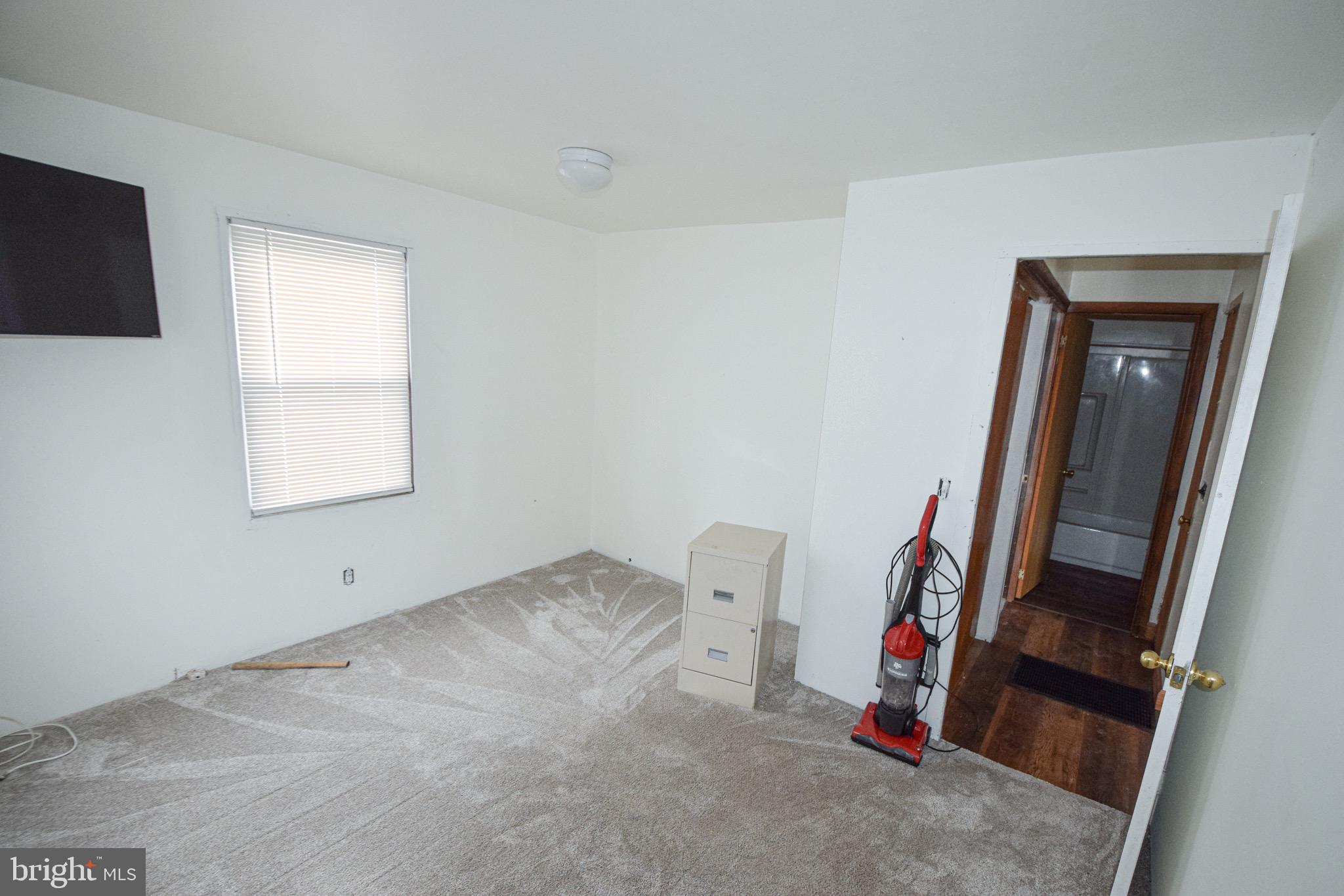 21 Right Aileron Baltimore, MD 21220 - Photo 9 of 31 a view of a room with gym equipment and a window