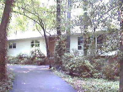 4512-4518 Forrestal Road Chester, VA 23831 - Photo 1 of 1 front view of a house with a tree