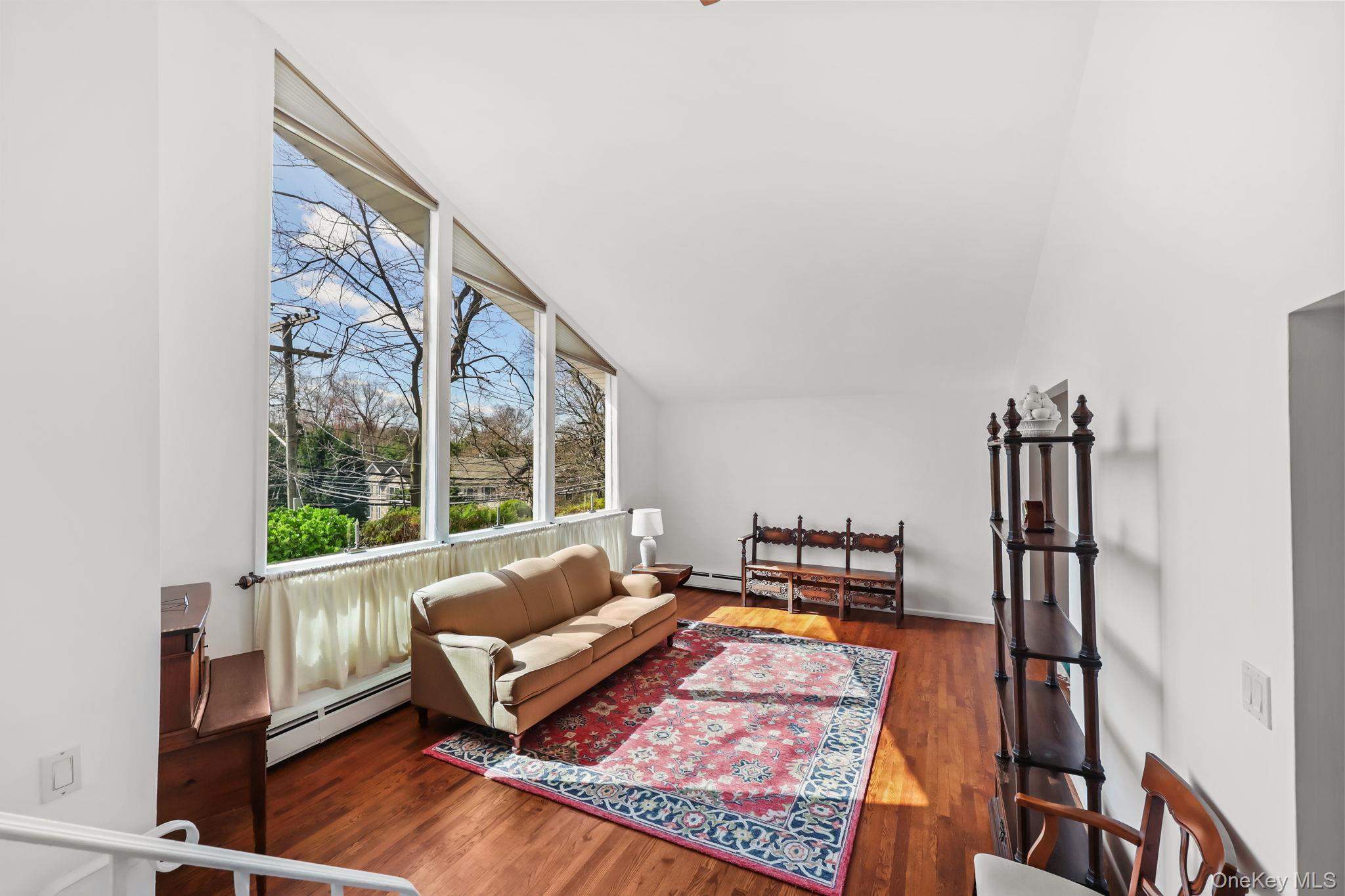 150 Rosedale Avenue White Plains, NY 10605 - Photo 13 of 42 a living room with furniture and a window