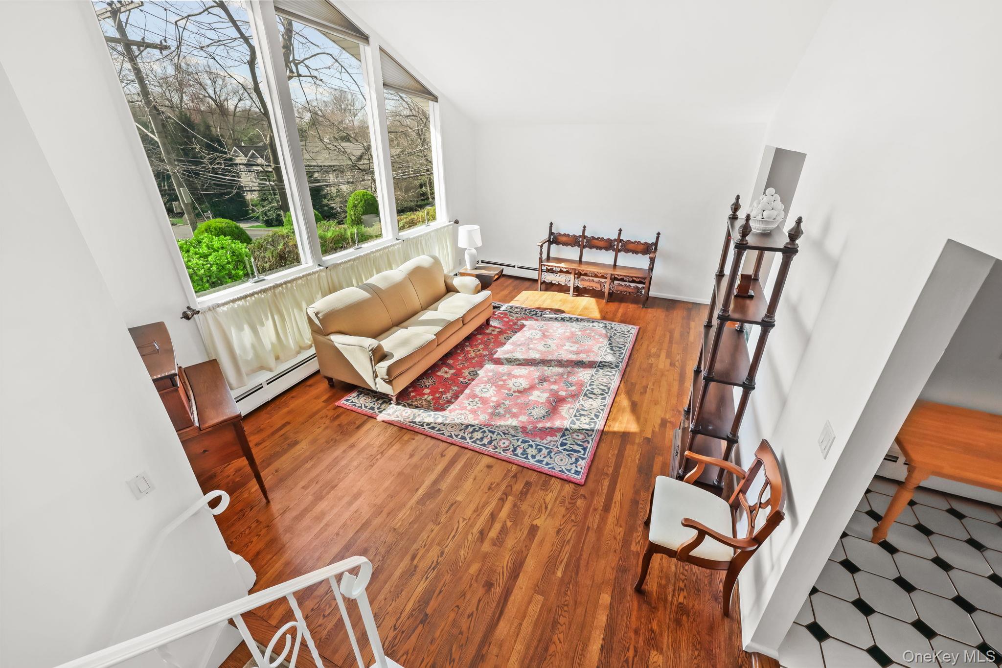 150 Rosedale Avenue White Plains, NY 10605 - Photo 14 of 42 a living room with furniture and a floor to ceiling window