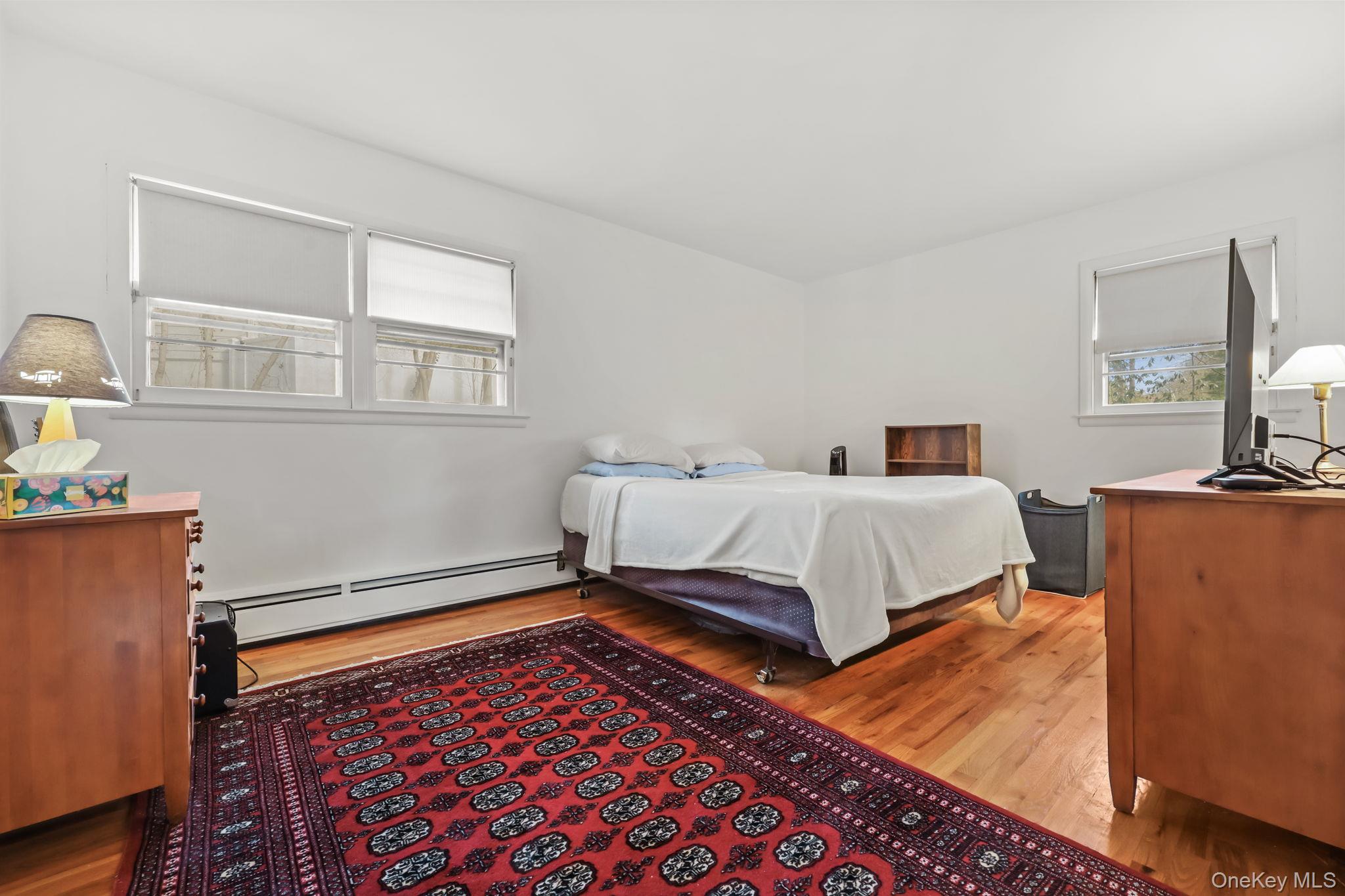 150 Rosedale Avenue White Plains, NY 10605 - Photo 15 of 42 a bed room with a bed and a tv