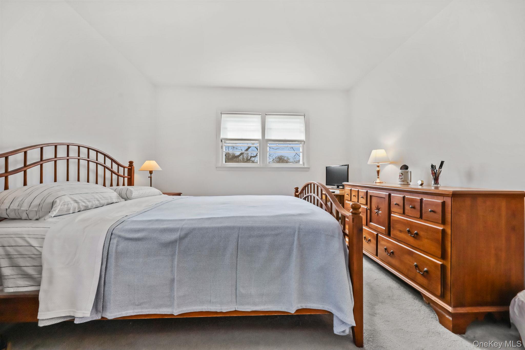 150 Rosedale Avenue White Plains, NY 10605 - Photo 20 of 42 a bedroom with a bed and a window