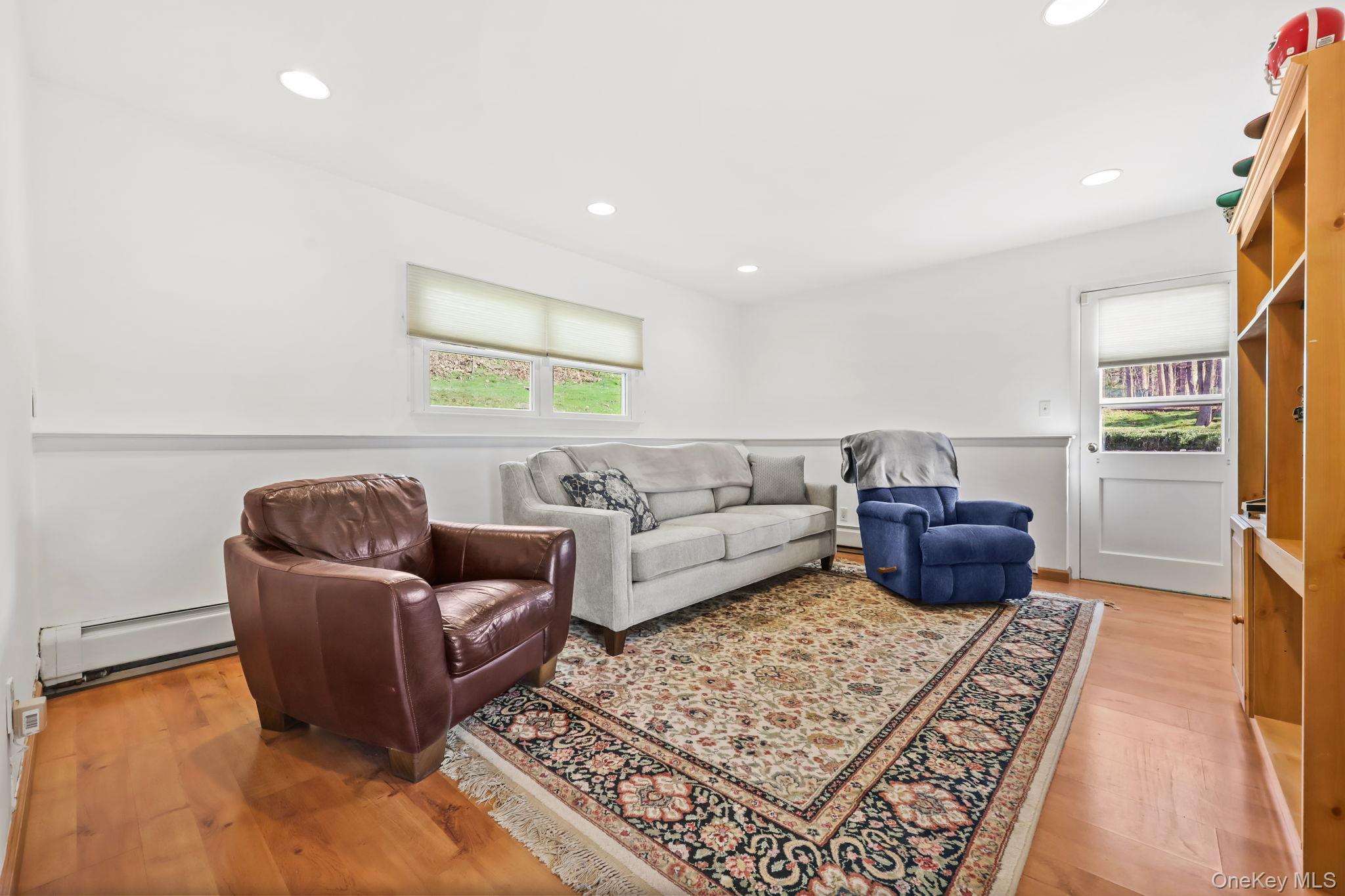 150 Rosedale Avenue White Plains, NY 10605 - Photo 25 of 42 a living room with furniture and a rug