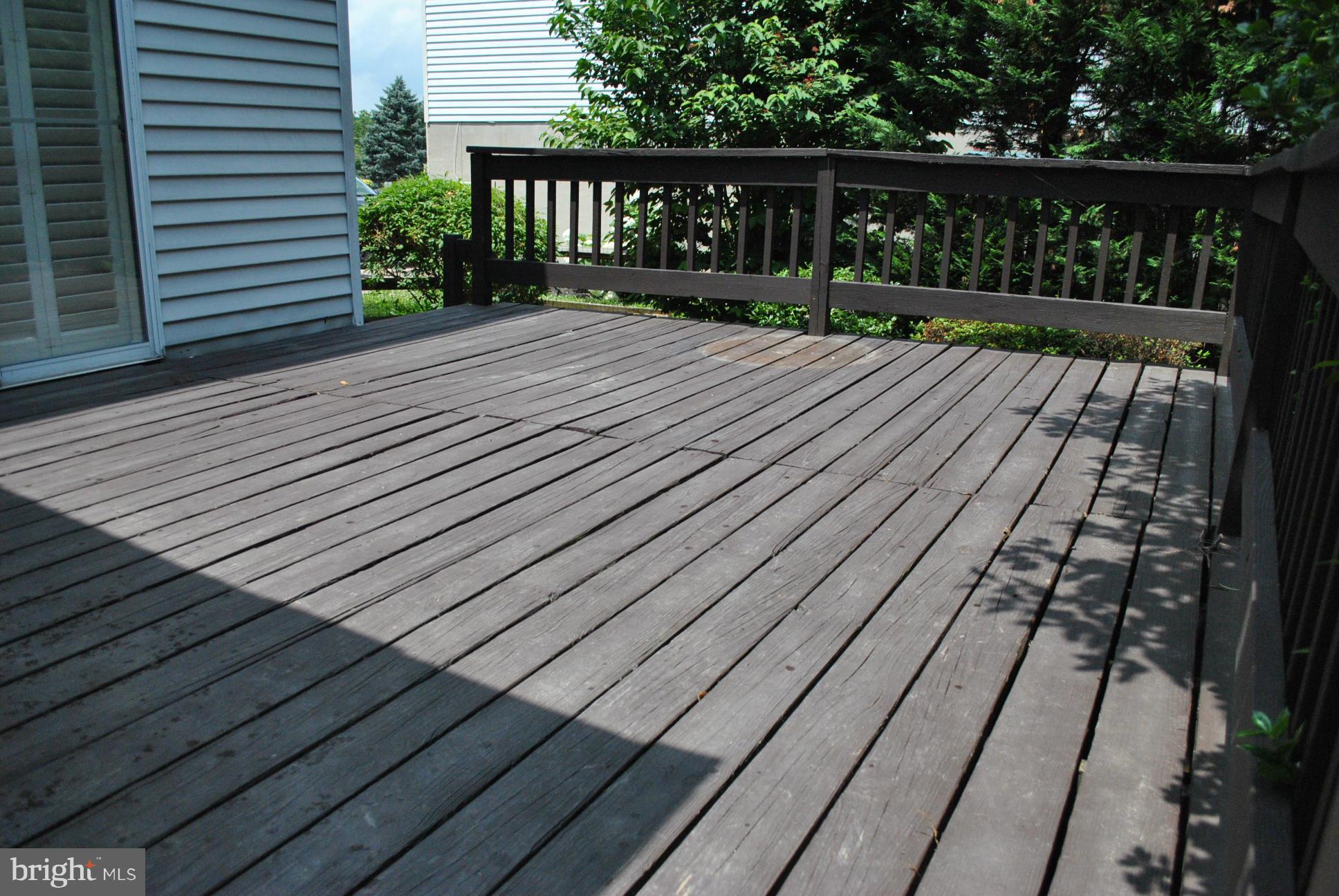 9421 Perglen Road Baltimore, MD 21236 - Photo 25 of 28 LARGE REAR DECK SURROUNDED BY NATURAL PRIVACY