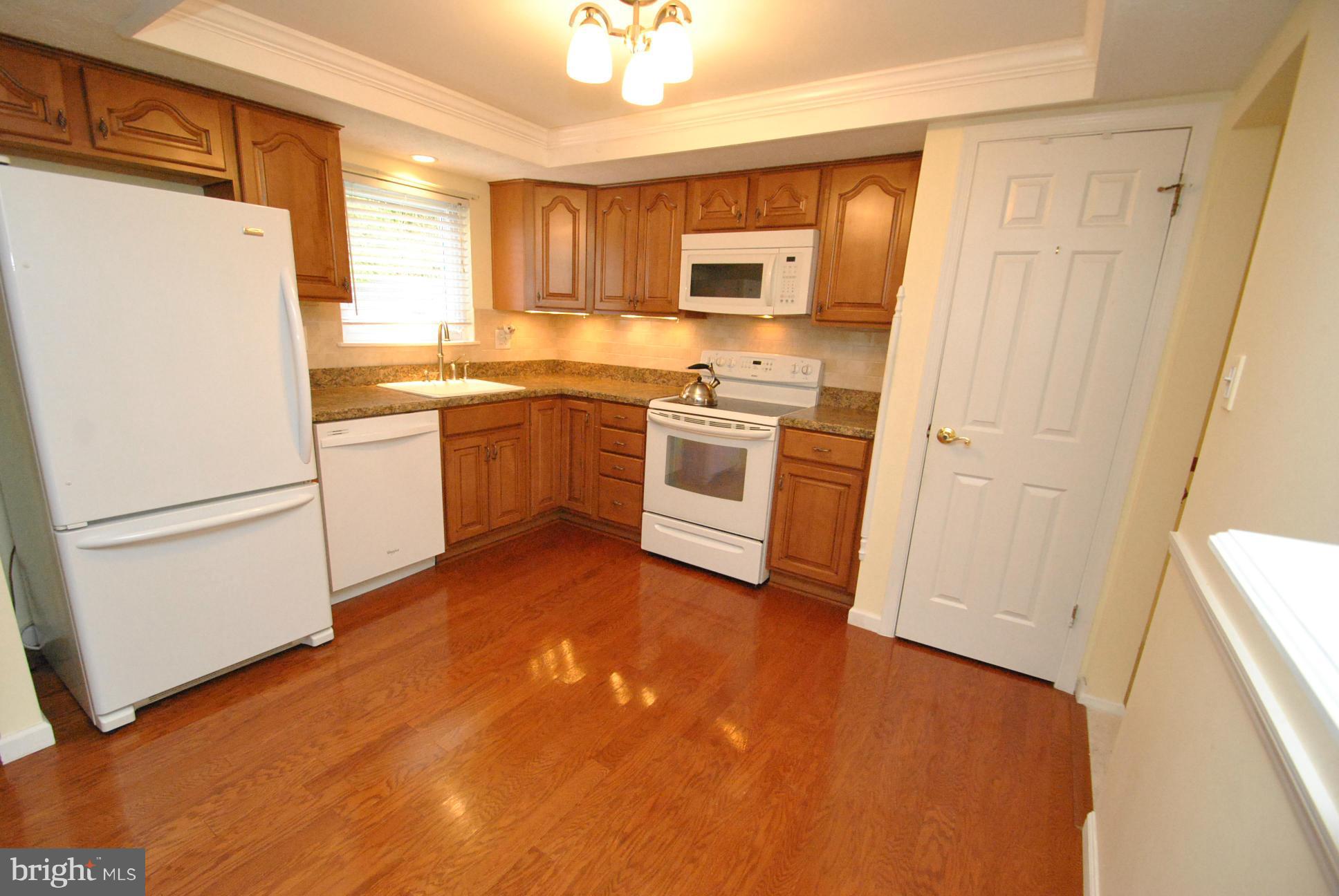 9421 Perglen Road Baltimore, MD 21236 - Photo 7 of 28 FULLY UPDATED KITCHEN - GLEAMING HARDWOOD FLOORS
