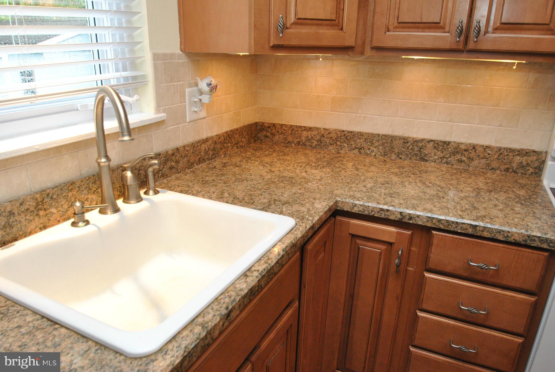9421 Perglen Road Baltimore, MD 21236 - Photo 8 of 28 FULLY UPDATED KITCHEN - SUBWAY TILE BACKSPLASH
