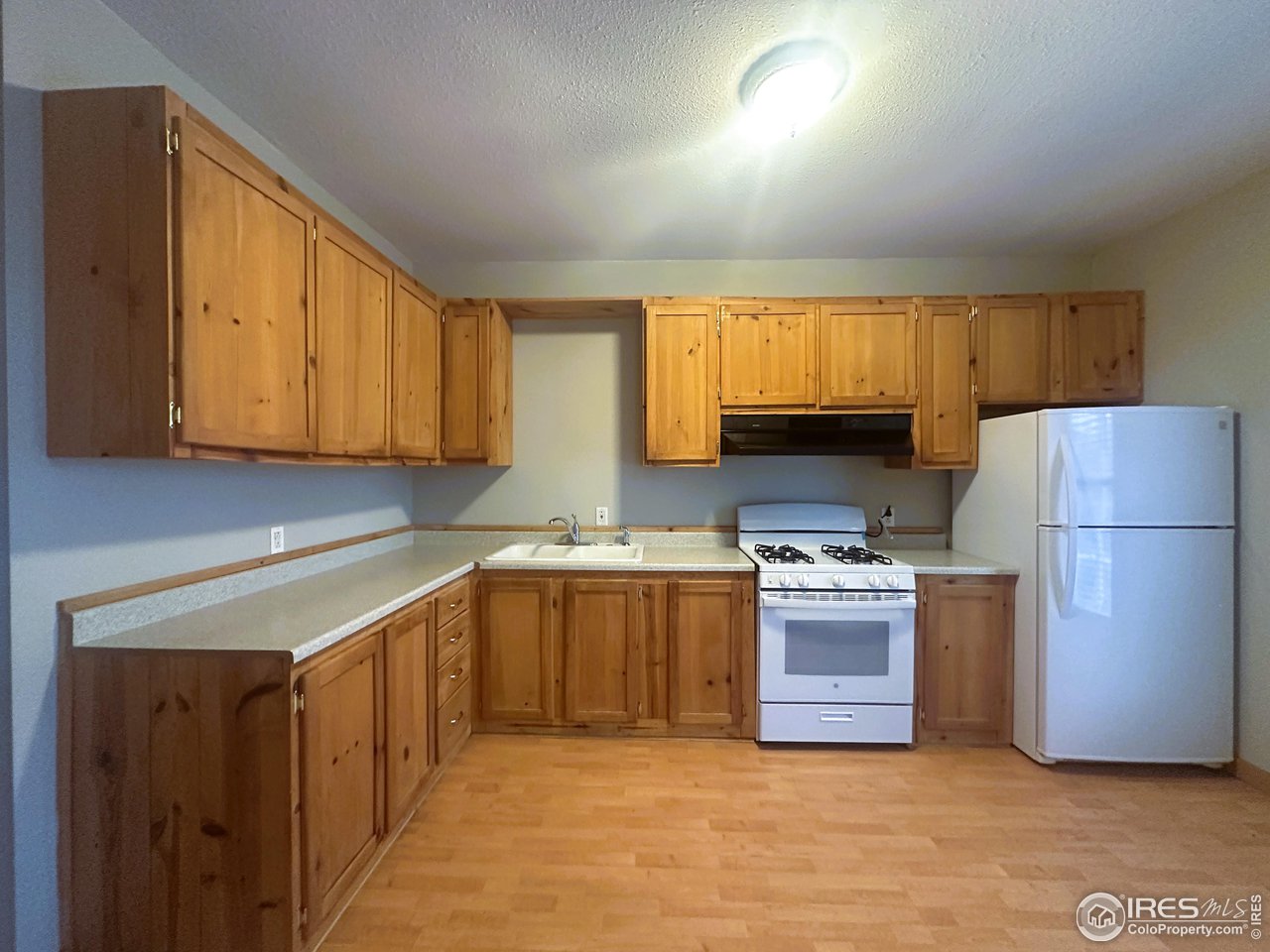 309 Phelps Street Sterling, CO 80751 - Photo 2 of 7 Kitchen with Eat in Nook