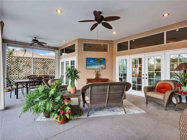 a living room with patio furniture