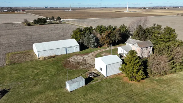 a view of a lake with a floor to ceiling window