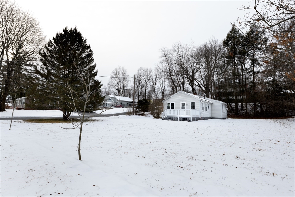 201 West Street Ware, MA 01082 - Photo 2 of 18 a view of a road with a snow in the yard