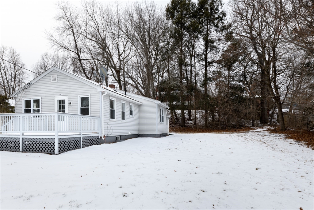 201 West Street Ware, MA 01082 - Photo 3 of 18 a white house that has a tree in front of it