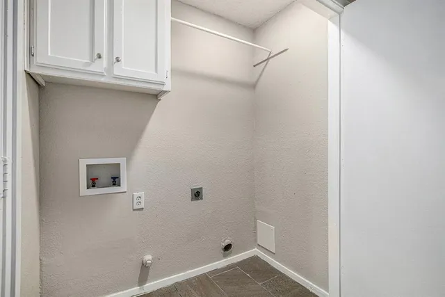 a view of a house with a tree