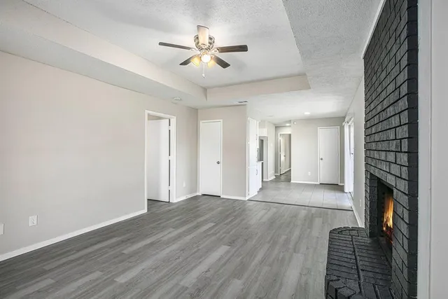 a kitchen with a refrigerator sink and microwave