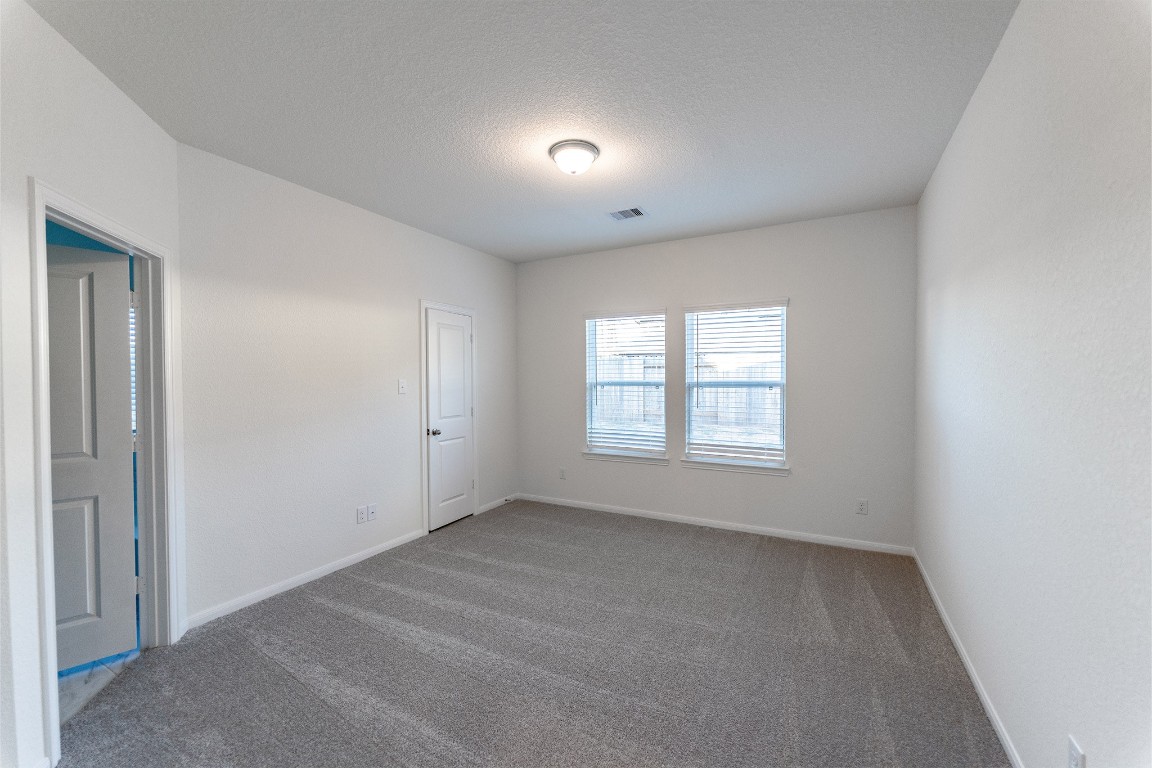 10638 Altitude Way Conroe, TX 77303 - Photo 17 of 29 a view of an empty room with a window
