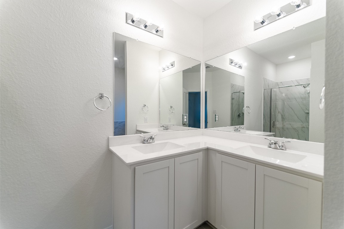 10638 Altitude Way Conroe, TX 77303 - Photo 19 of 29 a bathroom with a sink and a mirror