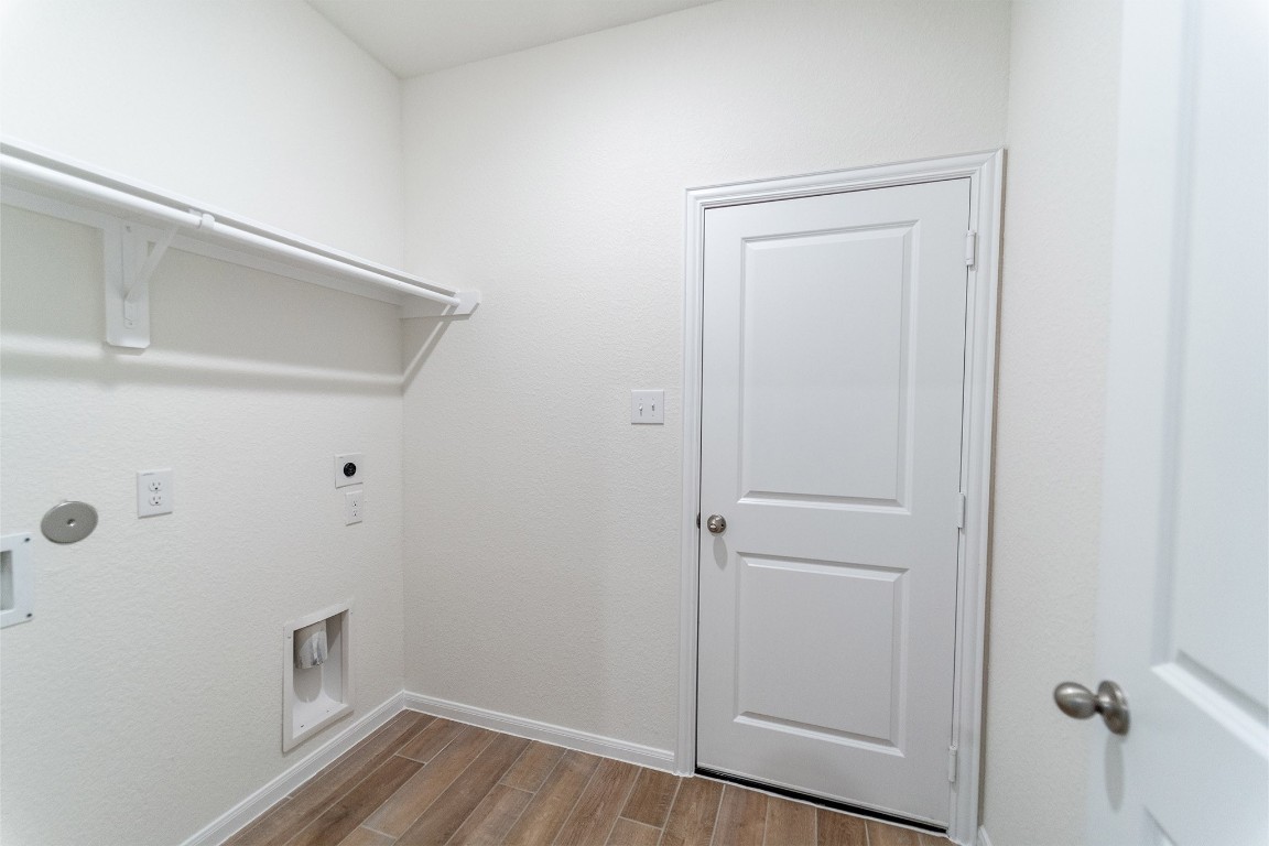10638 Altitude Way Conroe, TX 77303 - Photo 20 of 29 a view of room with hardwood floor