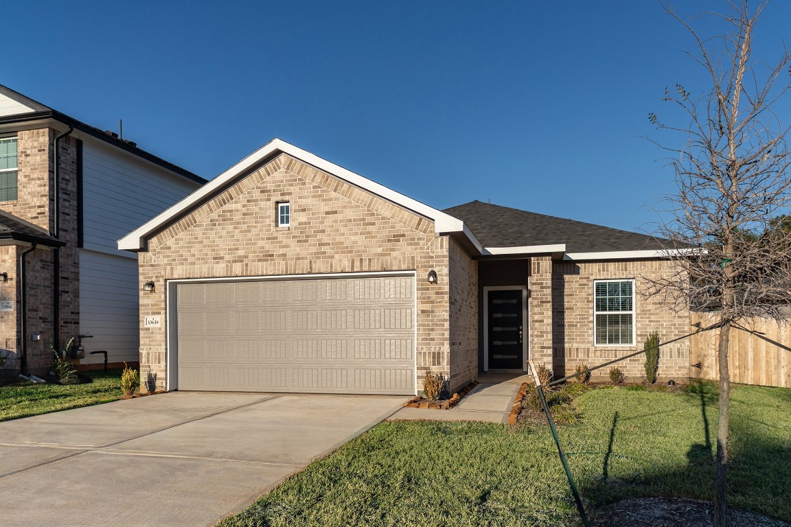 10638 Altitude Way Conroe, TX 77303 - Photo 3 of 29 a view of backyard of house