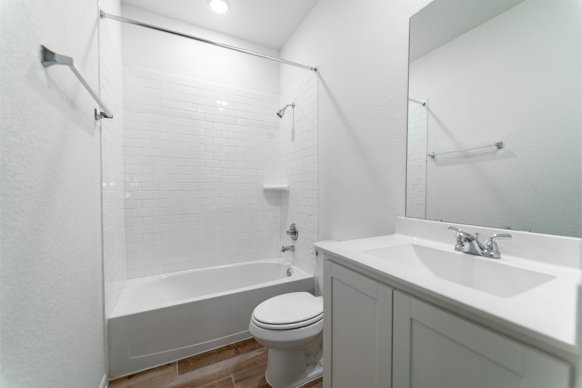 10638 Altitude Way Conroe, TX 77303 - Photo 5 of 29 a bathroom with a sink toilet and shower