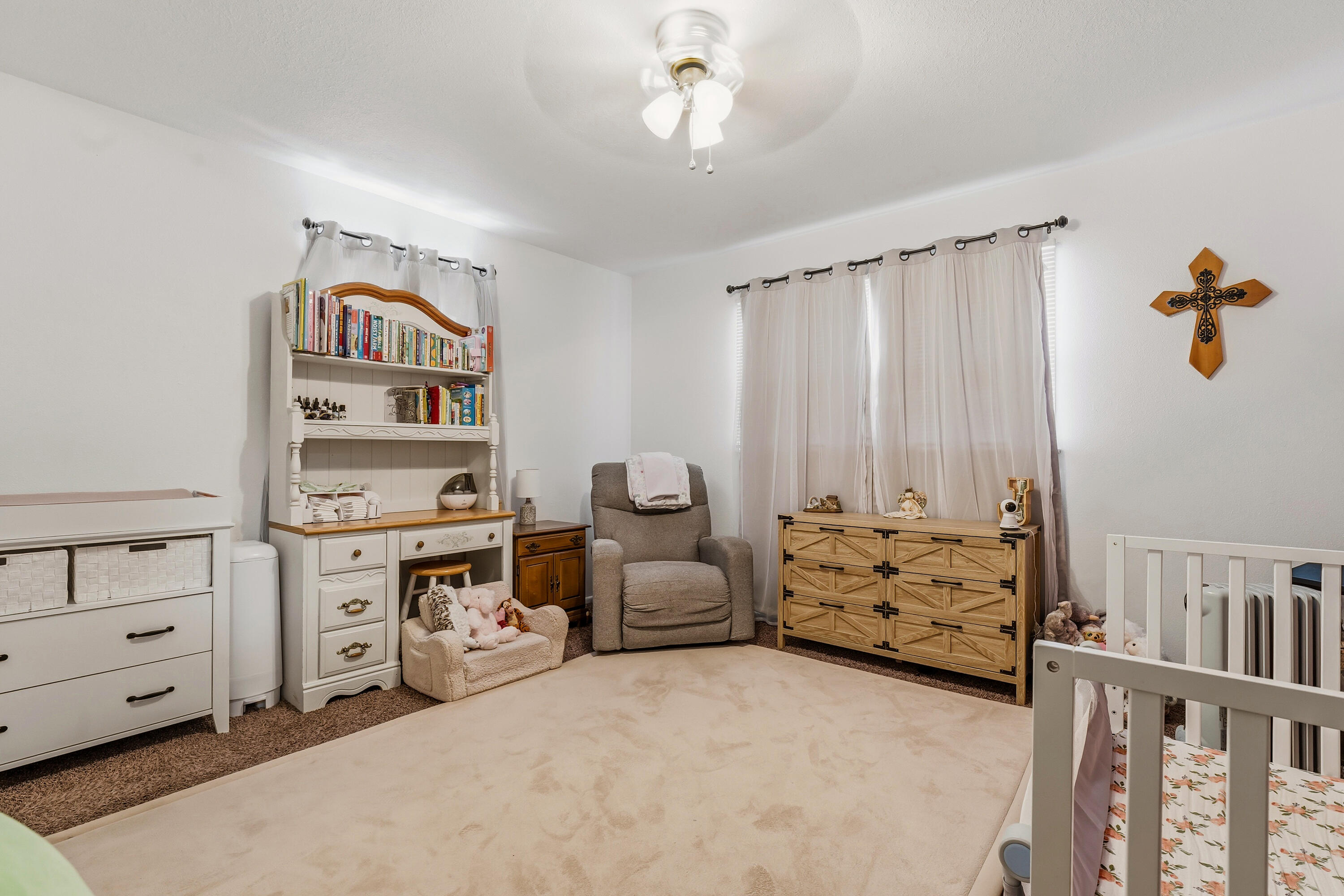 707 12th Street Shallowater, TX 79363 - Photo 14 of 27 a bed room with furniture and decor