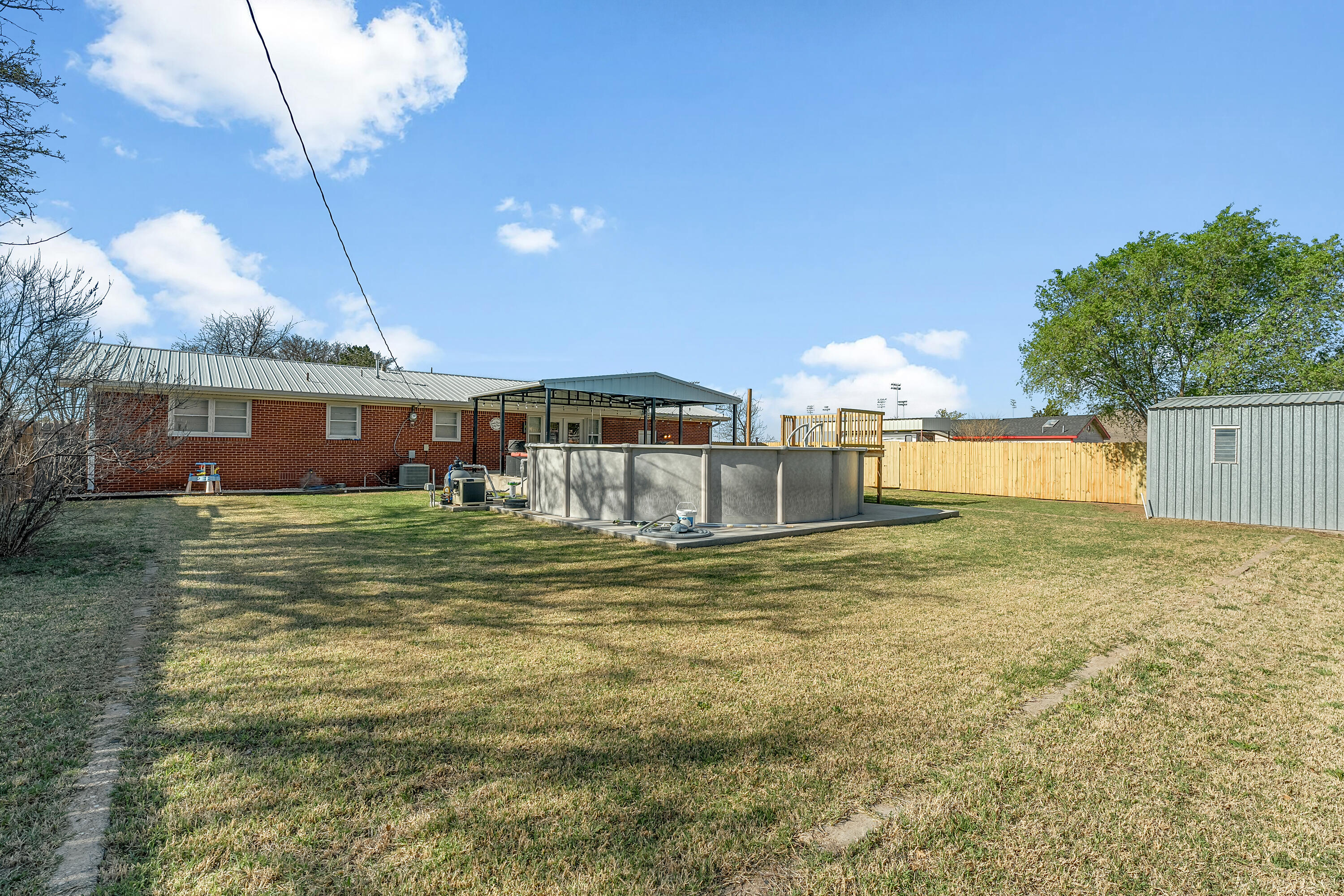 707 12th Street Shallowater, TX 79363 - Photo 25 of 27 a view of a house with a yard balcony and sitting area