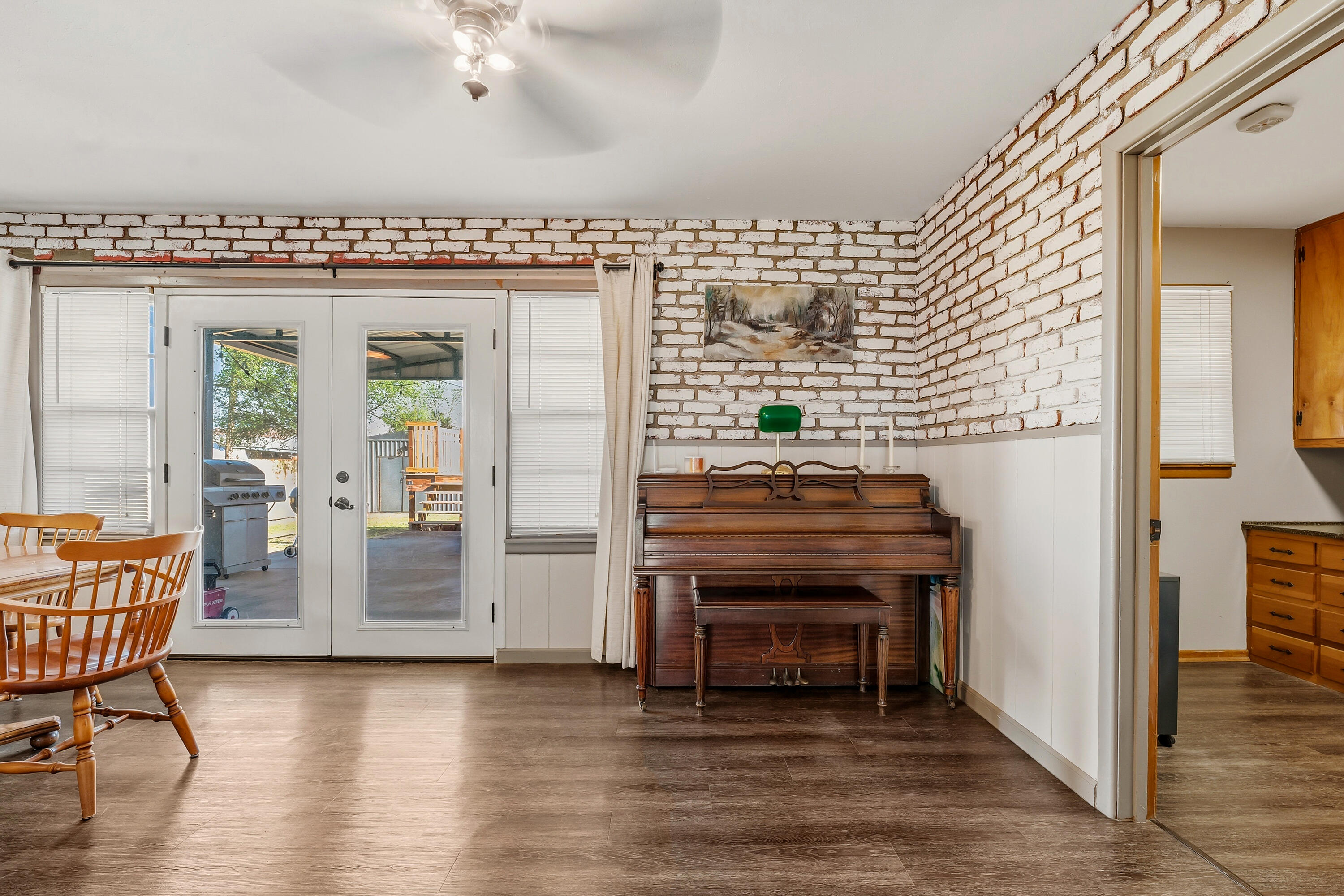 707 12th Street Shallowater, TX 79363 - Photo 8 of 27 an empty room with furniture and wooden floor