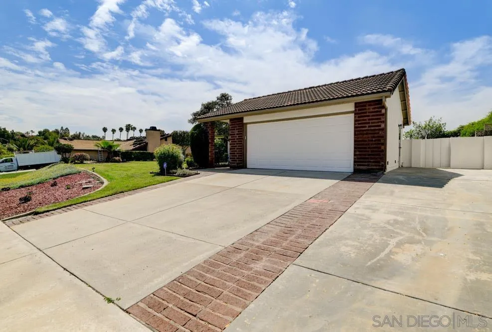4635 Briar Ridge Road Oceanside, CA 92056 - Photo 19 of 23 a view of a backyard of the house