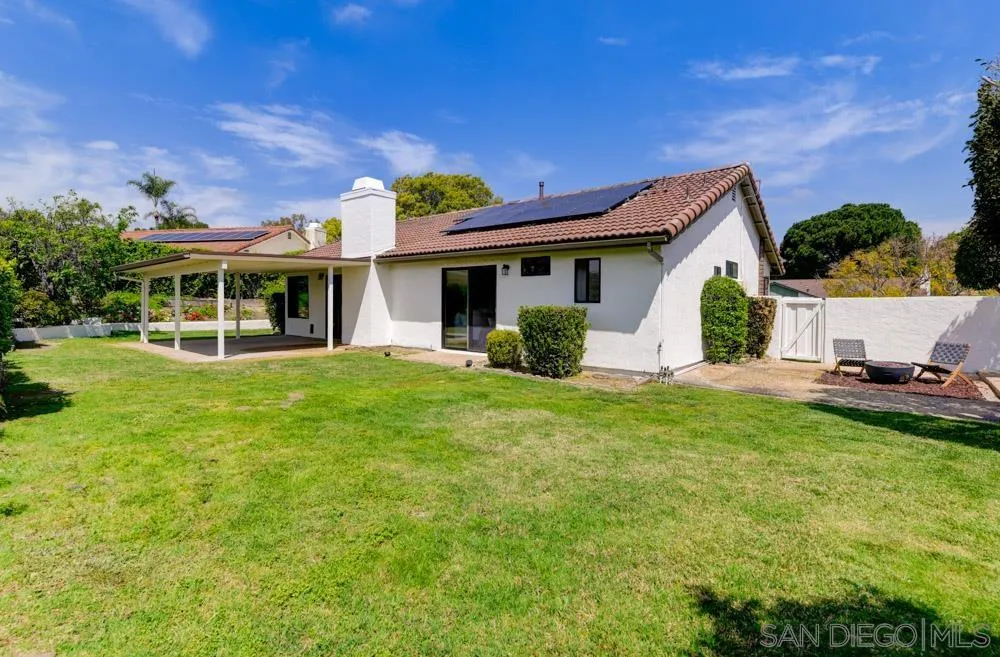 4635 Briar Ridge Road Oceanside, CA 92056 - Photo 20 of 23 a view of a house with backyard and porch