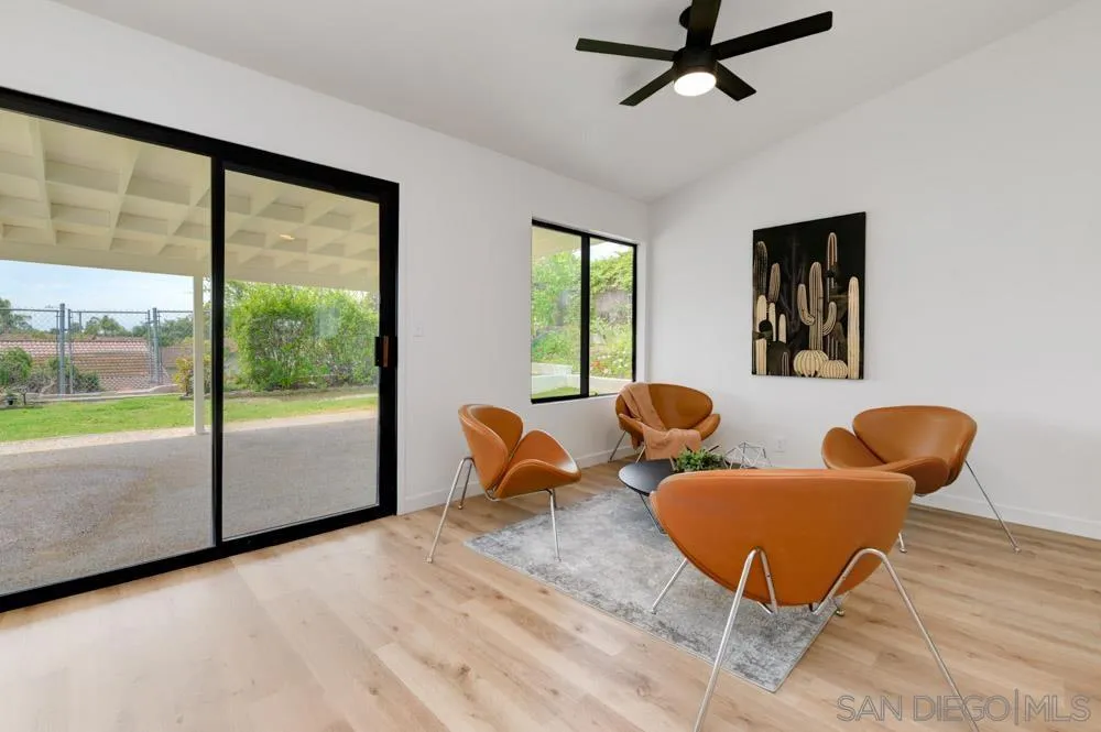4635 Briar Ridge Road Oceanside, CA 92056 - Photo 9 of 23 a view of a livingroom with furniture and a large window