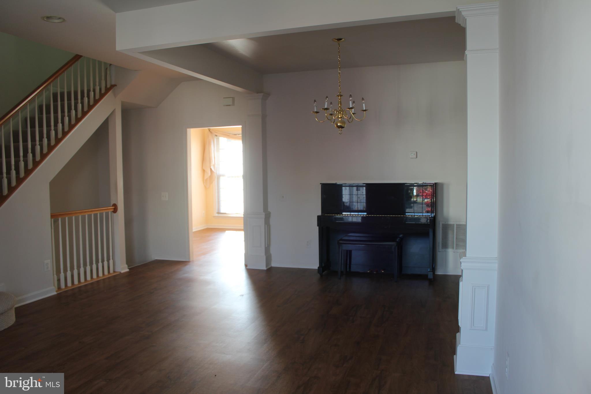 13507 Stargazer Terrace Centreville, VA 20120 - Photo 11 of 25 a living room with hard wood floors and a wooden floor
