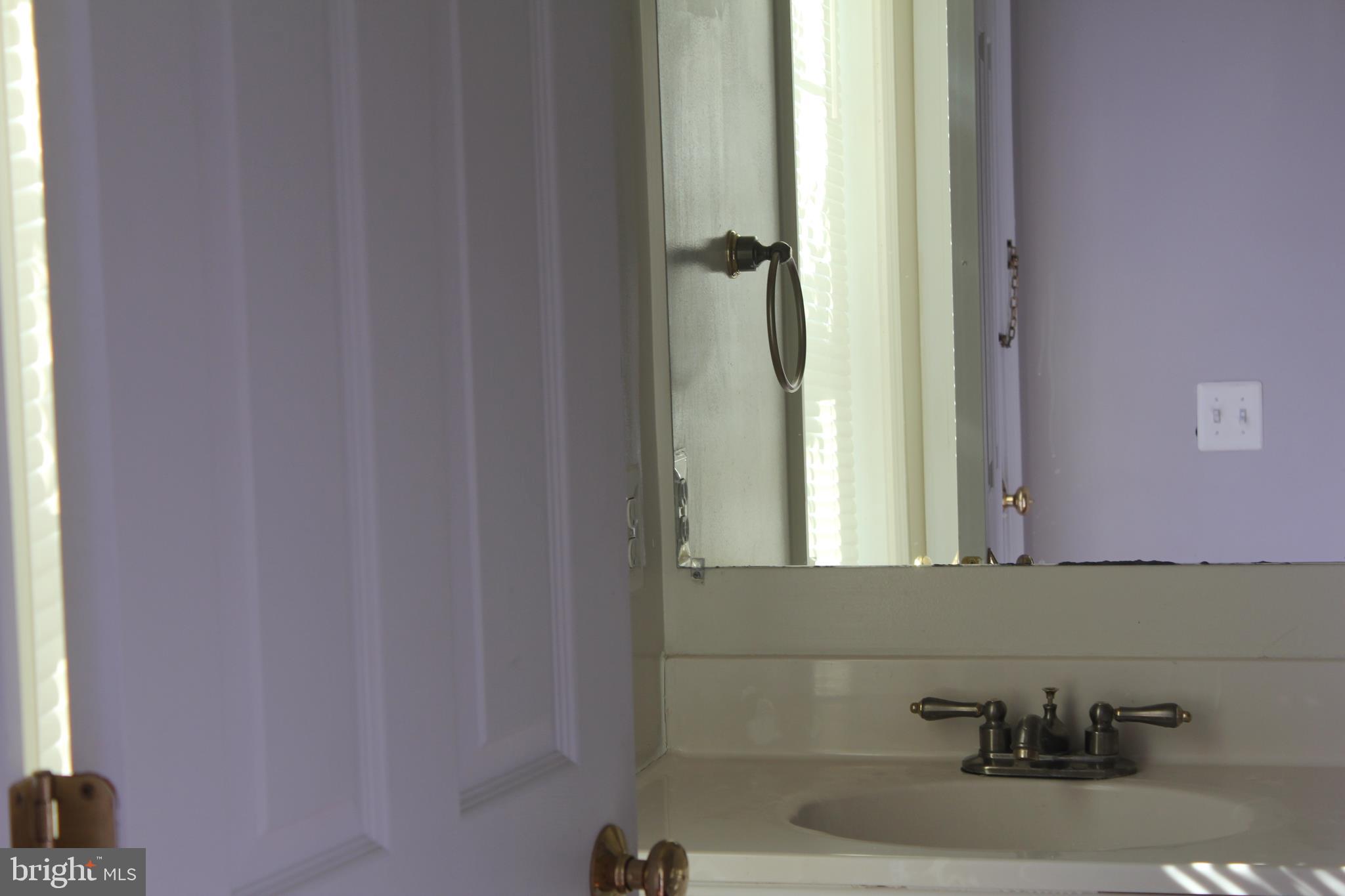 13507 Stargazer Terrace Centreville, VA 20120 - Photo 24 of 25 a bathroom with a bathtub and a sink