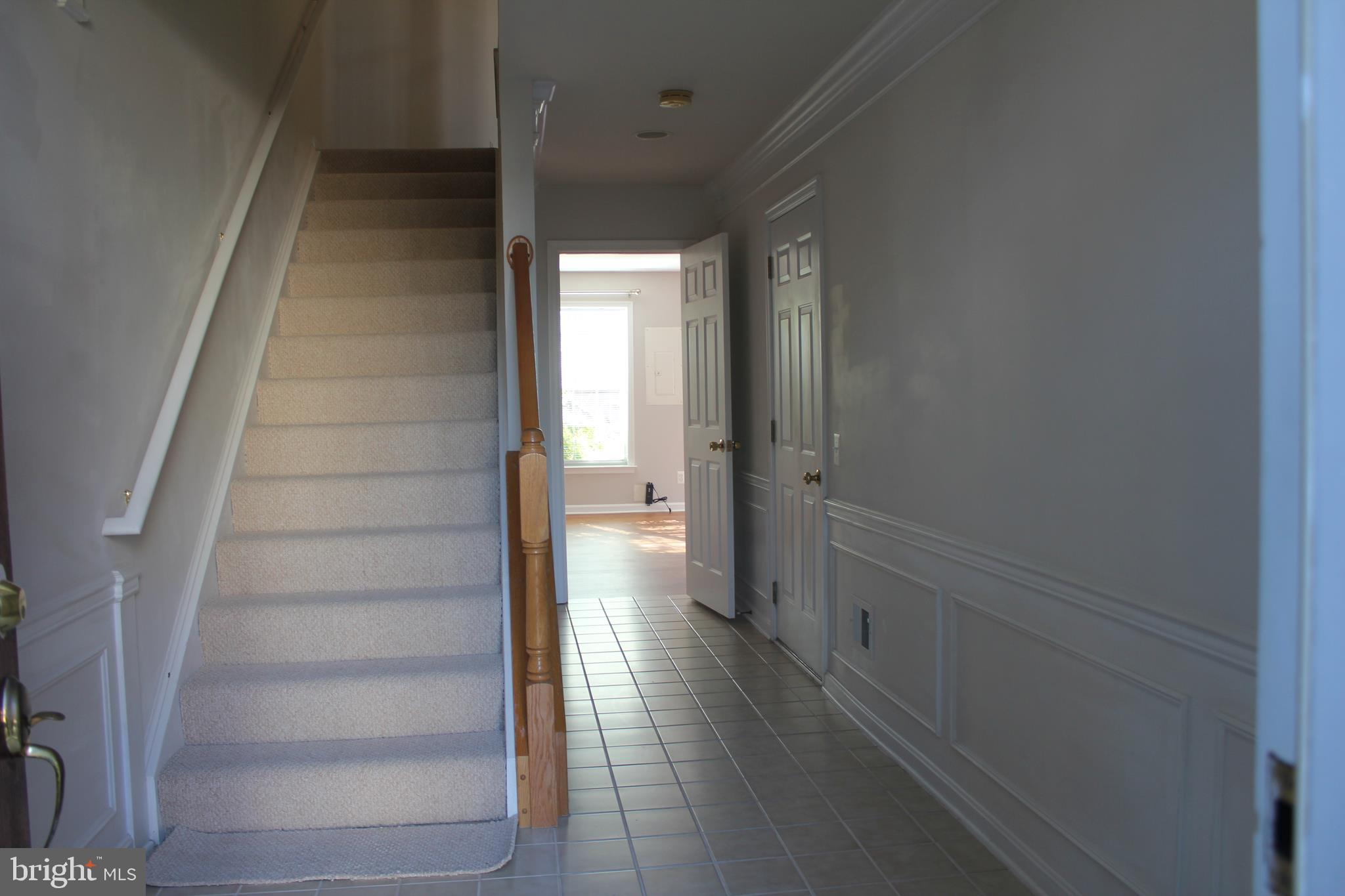 13507 Stargazer Terrace Centreville, VA 20120 - Photo 9 of 25 a view of a hallway with wooden floor and entryway