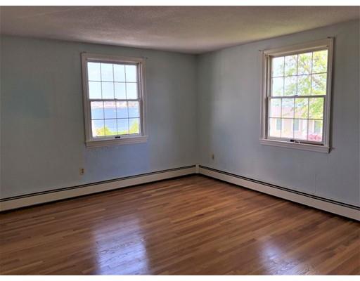 37 Crestwood Road Marblehead, MA 01945 - Photo 14 of 26 an empty room with wooden floor and windows