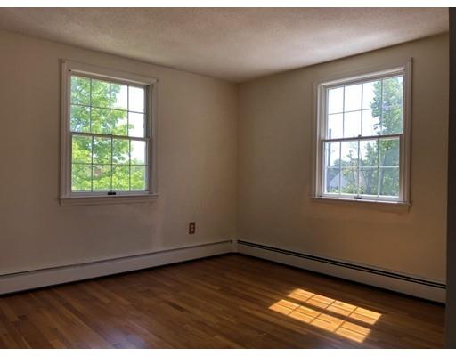 37 Crestwood Road Marblehead, MA 01945 - Photo 17 of 26 an empty room with wooden floor and windows