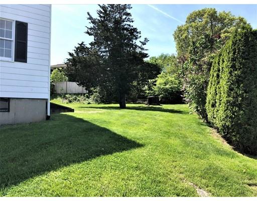 37 Crestwood Road Marblehead, MA 01945 - Photo 20 of 26 a view of a backyard with large trees
