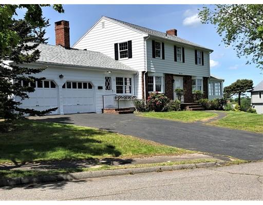 37 Crestwood Road Marblehead, MA 01945 - Photo 2 of 26 a view of a white house with large trees and a yard in front of it