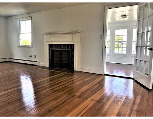 37 Crestwood Road Marblehead, MA 01945 - Photo 4 of 26 wooden floor fireplace and windows in an empty room