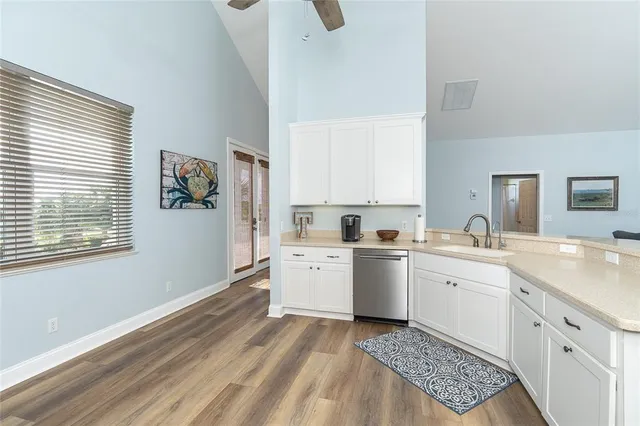 a kitchen with a refrigerator stove and microwave