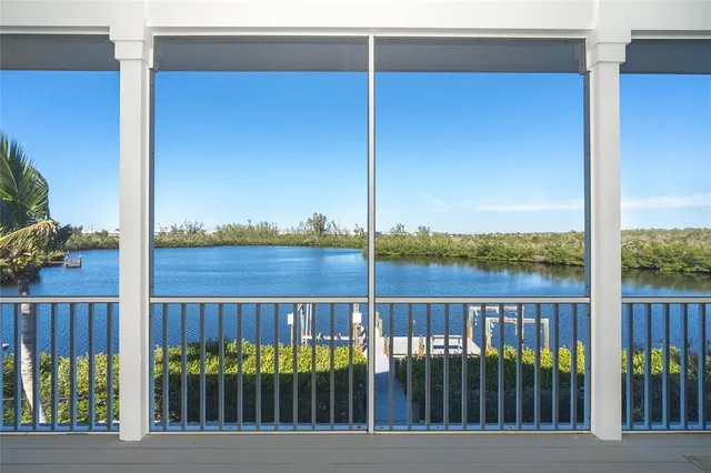 a view of a balcony with chairs