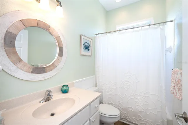 a view of a bedroom with baby crib