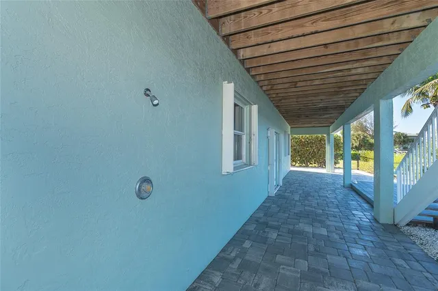 an aerial view of a houses with outdoor space